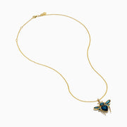 The Novelty 14K Yellow Gold Blue Topaz and Diamond Bee Pendant features a bee-shaped design with faceted blue topaz and diamond accents on its body and wings, shown against a white background.