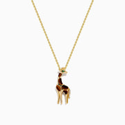 The Safari 14K Yellow Gold Tiger Eye Giraffe Pendant showcases a charming giraffe with brown and white enamel details and a green head accent, set against a plain white background.