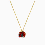 The 14K Yellow Gold Red Agate and Black Diamond Ladybug Pendant features red wings, black spots, and a black body, displayed against a white background.