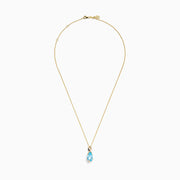 The Ocean Bleu 14K Yellow Gold Blue Topaz and Diamond Pear Pendant features a pear-shaped Blue Topaz accented with diamond swirls, set in 14K yellow gold and photographed on a plain white background.