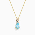 The Ocean Bleu 14K Yellow Gold Blue Topaz and Diamond Pear Pendant features a pear-shaped Blue Topaz accented with diamond swirls, set in 14K yellow gold and photographed on a plain white background.