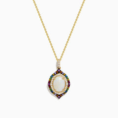 The Aurora 14K Yellow Gold Pendant features an ornate oval opal center, accented by diamonds and multi color sapphires in a decorative pattern on a gold chain necklace.