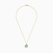 The Seaside 14K Gold Amazonite and Diamond Dolphins Pendant features a round amazonite with diamond accents and dolphin motifs on a delicate gold chain, displayed against a white background.