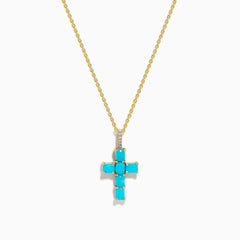 The 14K Yellow Gold Turquoise and Diamond Cross Pendant features a turquoise cross accented with sparkling diamonds for an elegant touch.