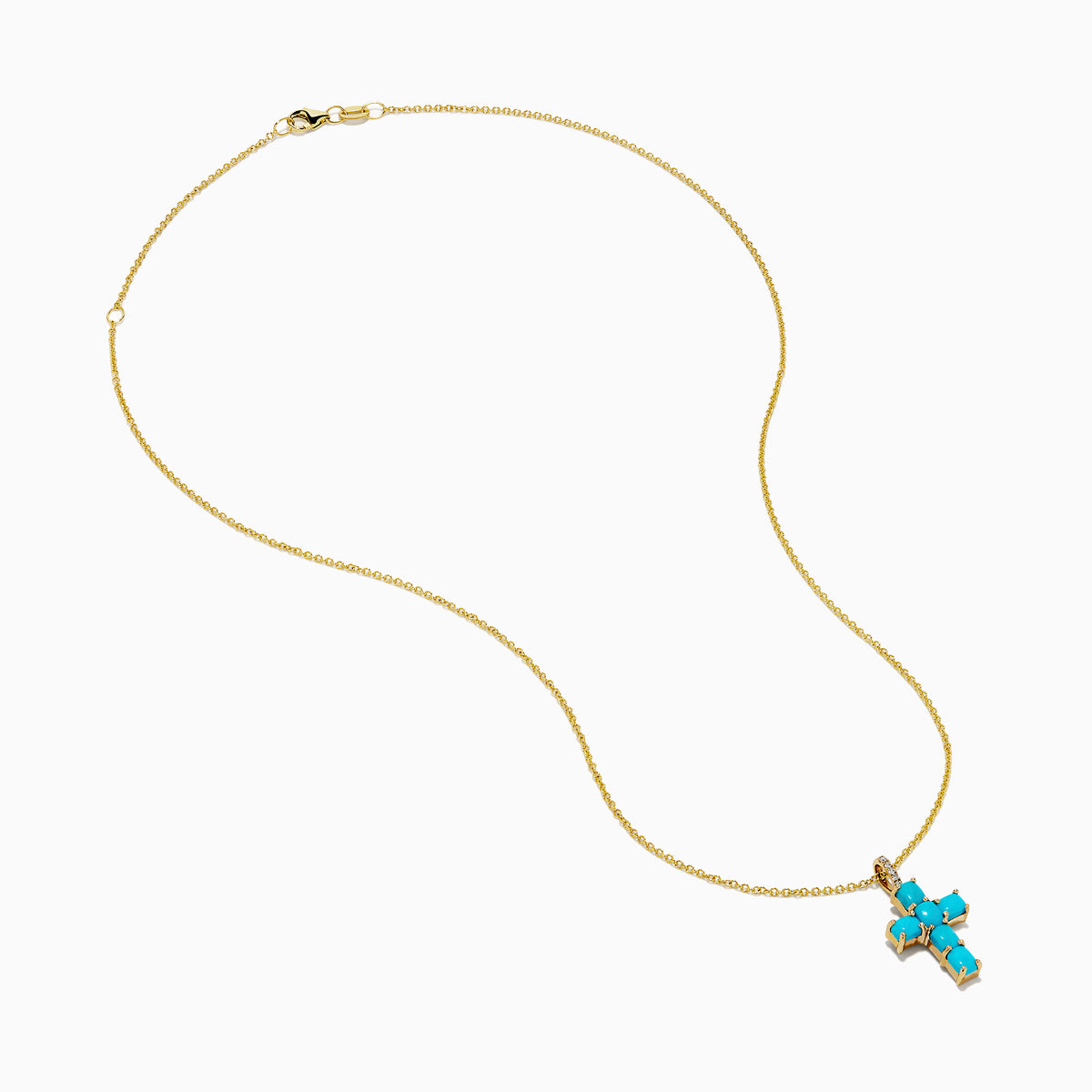 The 14K Yellow Gold Turquoise and Diamond Cross Pendant features a turquoise cross accented with sparkling diamonds for an elegant touch.