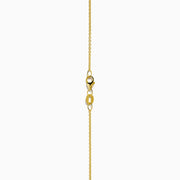 The 14K Yellow Gold Turquoise and Diamond Cross Pendant features a turquoise cross accented with sparkling diamonds for an elegant touch.