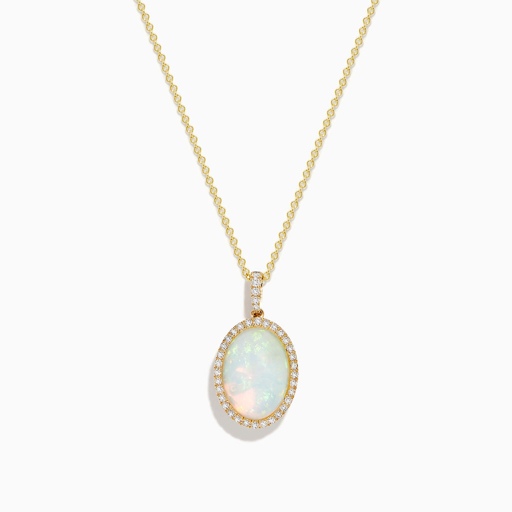 The 14K Yellow Gold Opal and Diamond Pendant features a delicate yellow gold chain with an oval opal center, accented by a halo of sparkling diamonds.