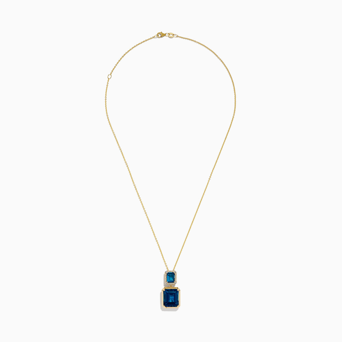 The 14K Yellow Gold London Blue Topaz and Diamond Pendant features two rectangular topaz stones—one accented with diamonds—suspended vertically from a fine gold chain.
