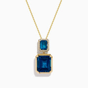 The 14K Yellow Gold London Blue Topaz and Diamond Pendant features two rectangular topaz stones—one accented with diamonds—suspended vertically from a fine gold chain.