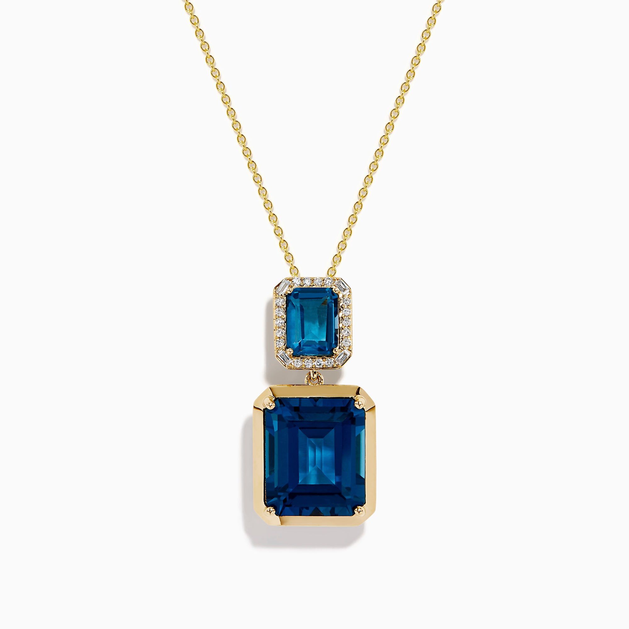 The 14K Yellow Gold London Blue Topaz and Diamond Pendant features two rectangular topaz stones—one accented with diamonds—suspended vertically from a fine gold chain.