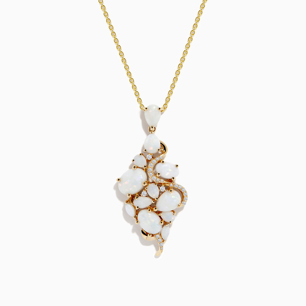 The Aurora 14K Yellow Gold Opal and Diamond Pendant features clustered white opal stones and small diamonds set in gold, creating an organic, elegant design on a yellow gold chain necklace.