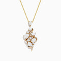 The Aurora 14K Yellow Gold Opal and Diamond Pendant features clustered white opal stones and small diamonds set in gold, creating an organic, elegant design on a yellow gold chain necklace.