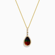 The 14K Yellow Gold Ammolite and Diamond Pendant features a pear-shaped Ammolite accented with small diamonds, set in yellow gold.