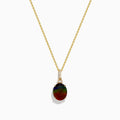 The 14K Yellow Gold Ammolite and Diamond Pendant features a faceted oval ammolite in dark iridescent hues, accented by rectangular diamonds above the gem. Shown on a white background.