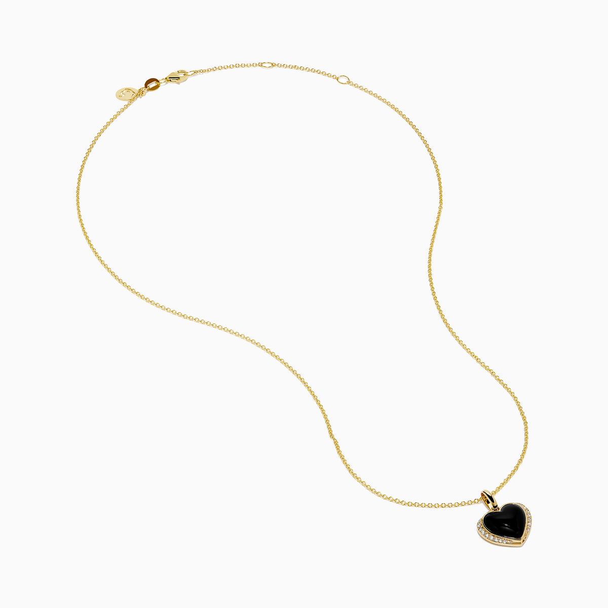 The 14K Yellow Gold Onyx and Diamond Heart Pendant features a glossy black onyx center surrounded by sparkling diamonds, all set on a yellow gold chain necklace.