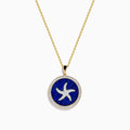 The Seaside 14K Yellow Gold Lapis and Diamond Starfish Pendant features a round lapis center with a white starfish design and a border of sparkling diamonds.