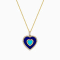 The Novelty 14K Yellow Gold Lapis, Turquoise and Diamond Heart Pendant features a turquoise heart center framed by lapis-blue and bordered with sparkling diamonds on a gold chain.