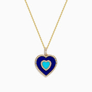 The Novelty 14K Yellow Gold Lapis, Turquoise and Diamond Heart Pendant features a turquoise heart center framed by lapis-blue and bordered with sparkling diamonds on a gold chain.