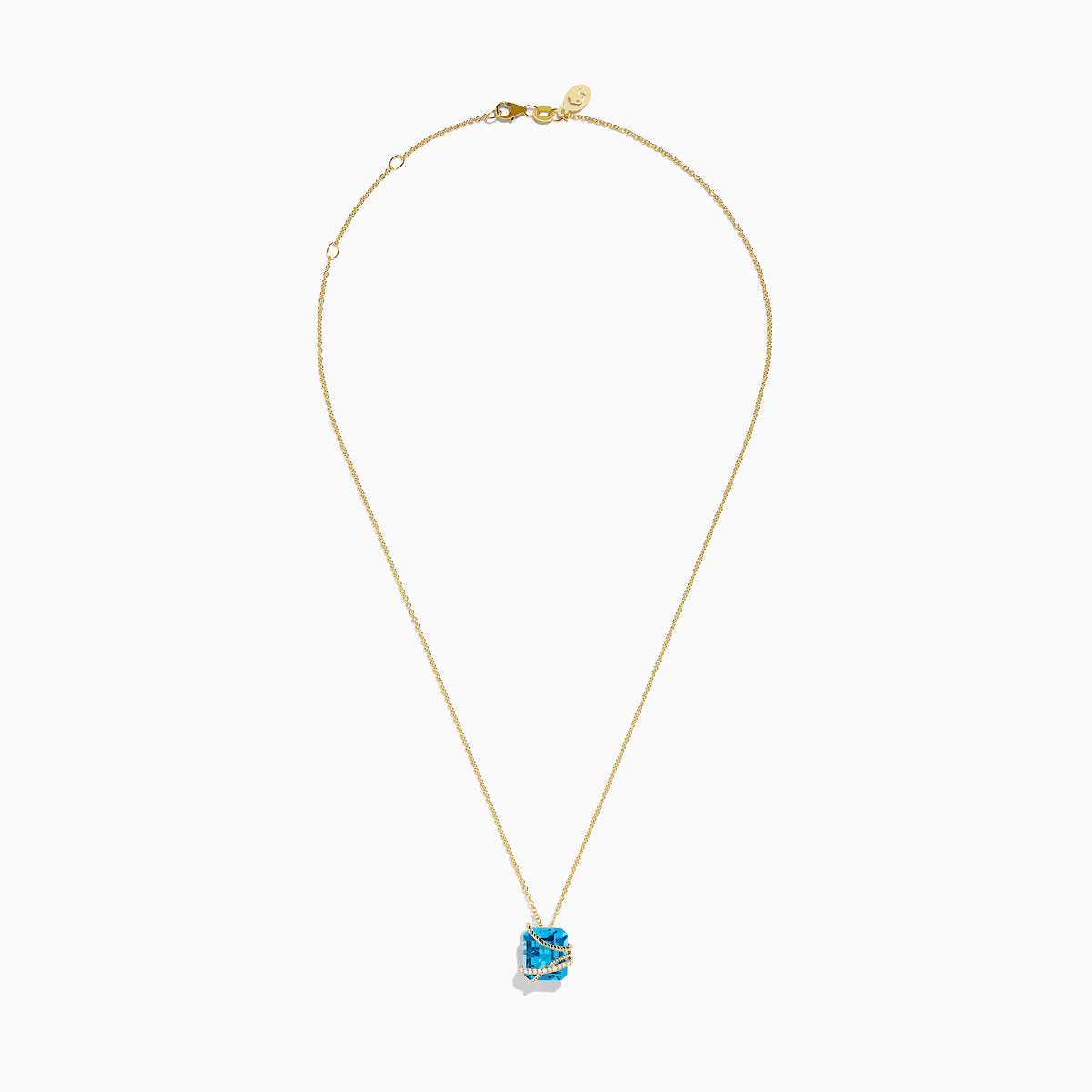 The Ocean Bleu 14K Yellow Gold Blue Topaz Pendant features a square-cut blue topaz wrapped in a diagonal gold band set with small white diamonds, displayed on a plain white background.