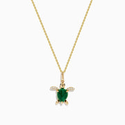 The Seaside 14K Yellow Gold Malachite and Diamond Turtle Pendant features a malachite shell and sparkling diamonds on the flippers, displayed against a white background.