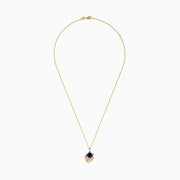 Seaside 14K Yellow Gold Lapis Lazuli Octopus Pendant features a deep blue lapis lazuli center accented with small clear stones in an ornate, sea-inspired 14K yellow gold setting.