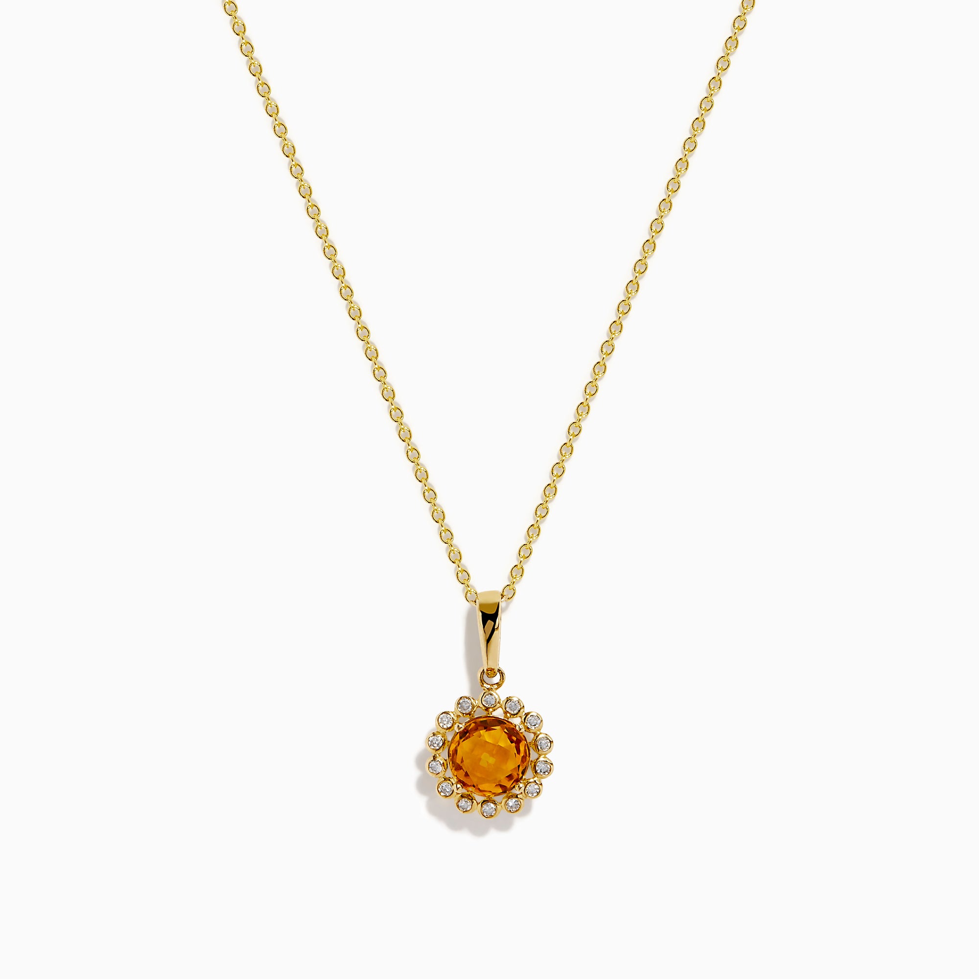 The 14K Yellow Gold Citrine and Diamond Halo Pendant features a round citrine center with a diamond halo, set on a gold chain and displayed against a white background.