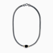 The Eclipse 925 Sterling Silver and 14K Yellow Gold Onyx Necklace features a snake chain and a central black onyx gemstone in an elegant silver and yellow gold-accented setting.