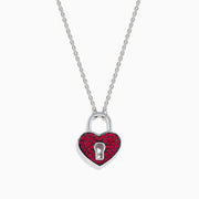 The 925 Sterling Silver Ruby Heart Lock Necklace features a heart-shaped padlock pendant with small red gemstones and a central keyhole, displayed on a white background.