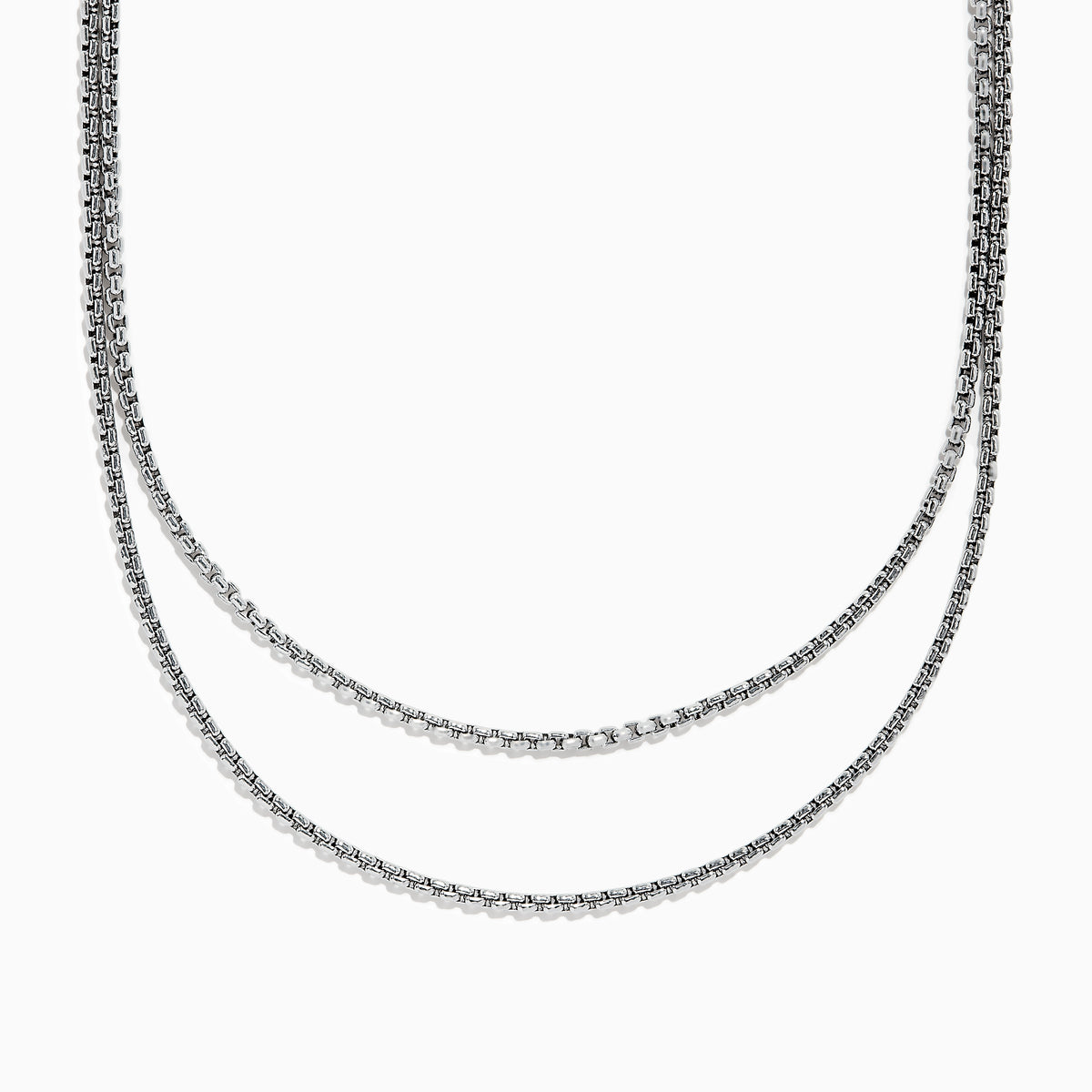The Mens 925 Sterling Silver Chain Necklace features a two-layered box link design, displayed in a gentle curve on a plain white background to showcase its shiny metallic finish and simple elegance. Ideal as a mens accessory.