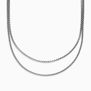 The Mens 925 Sterling Silver Chain Necklace features a two-layered box link design, displayed in a gentle curve on a plain white background to showcase its shiny metallic finish and simple elegance. Ideal as a mens accessory.