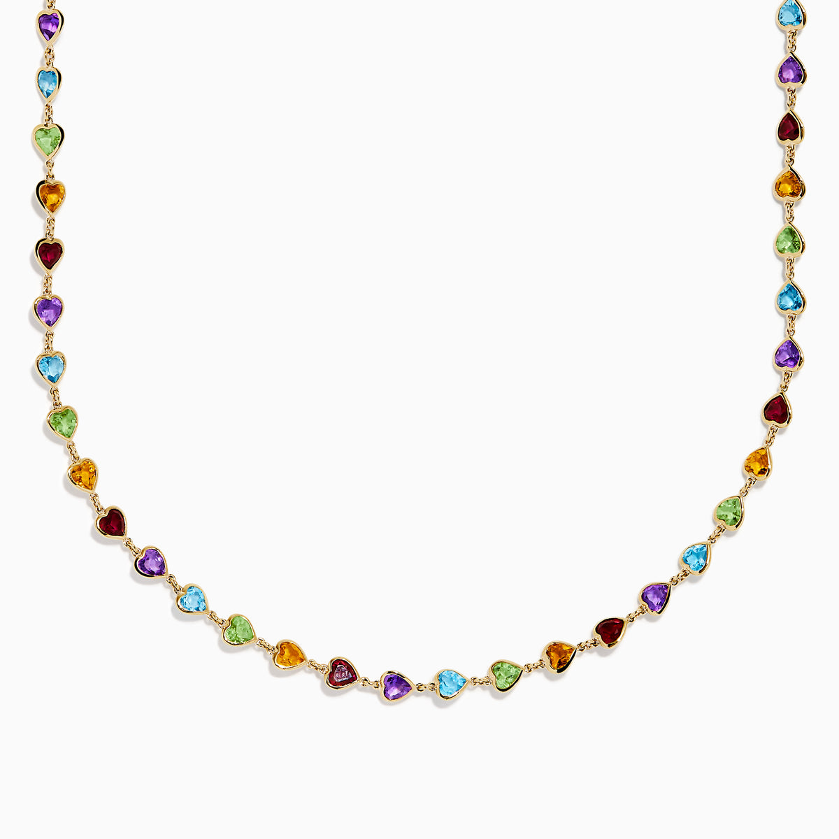 The 14K Yellow Gold Multi-Gemstone Bezel Heart Station Necklace showcases vibrant heart-shaped gemstones bezel-set and evenly spaced along a delicate yellow gold chain.