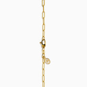 The 14K Yellow Gold Multi-Gemstone Paperclip Chain Fringe Necklace features vibrant gemstones in assorted shapes and sizes along a paperclip chain, beautifully displayed on a white background.