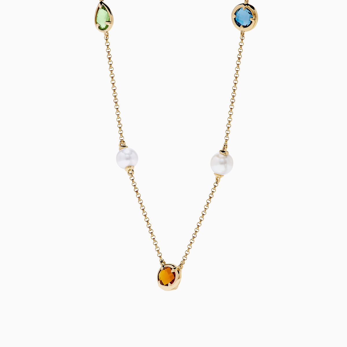 The Mosaic 14K Yellow Multi Color Gemstone and Fresh Water Pearl Station Necklace features evenly spaced blue, orange, and green gemstones with fresh water pearls on a gold chain, displayed on a white background.