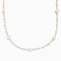 The 14K Yellow Gold Cultured Fresh Water Pearl Station Necklace features small, evenly spaced pearls along a fine gold chain for an elegant, minimalist look. Pearls vary slightly in size for added delicacy.