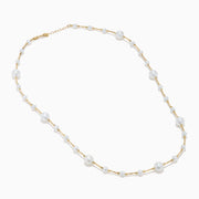 The 14K Yellow Gold Cultured Fresh Water Pearl Station Necklace features small, evenly spaced pearls along a fine gold chain for an elegant, minimalist look. Pearls vary slightly in size for added delicacy.