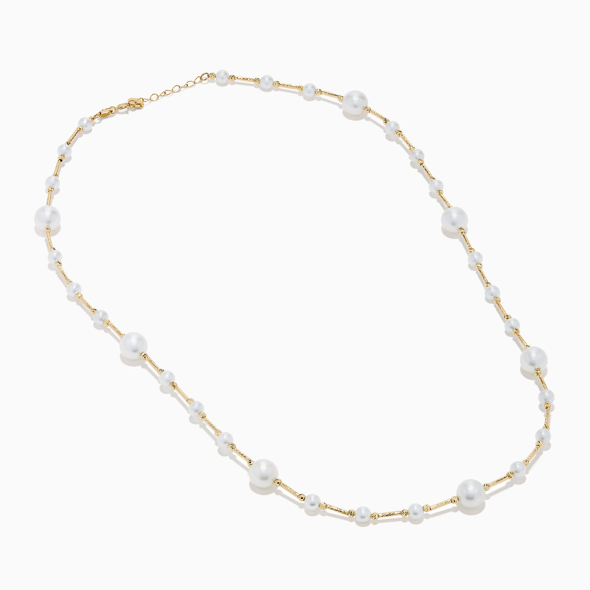 The 14K Yellow Gold Cultured Fresh Water Pearl Station Necklace features small, evenly spaced pearls along a fine gold chain for an elegant, minimalist look. Pearls vary slightly in size for added delicacy.