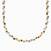 The Mosaic 14K Yellow Gold Multi Color Gemstone and Diamond Necklace features a delicate gold chain adorned with beautifully spaced round gemstones in blue, green, purple, red, and yellow.