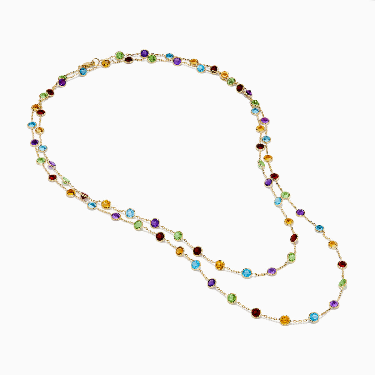 The Mosaic 14K Yellow Gold Multi Color Gemstone and Diamond Necklace features a delicate gold chain adorned with beautifully spaced round gemstones in blue, green, purple, red, and yellow.