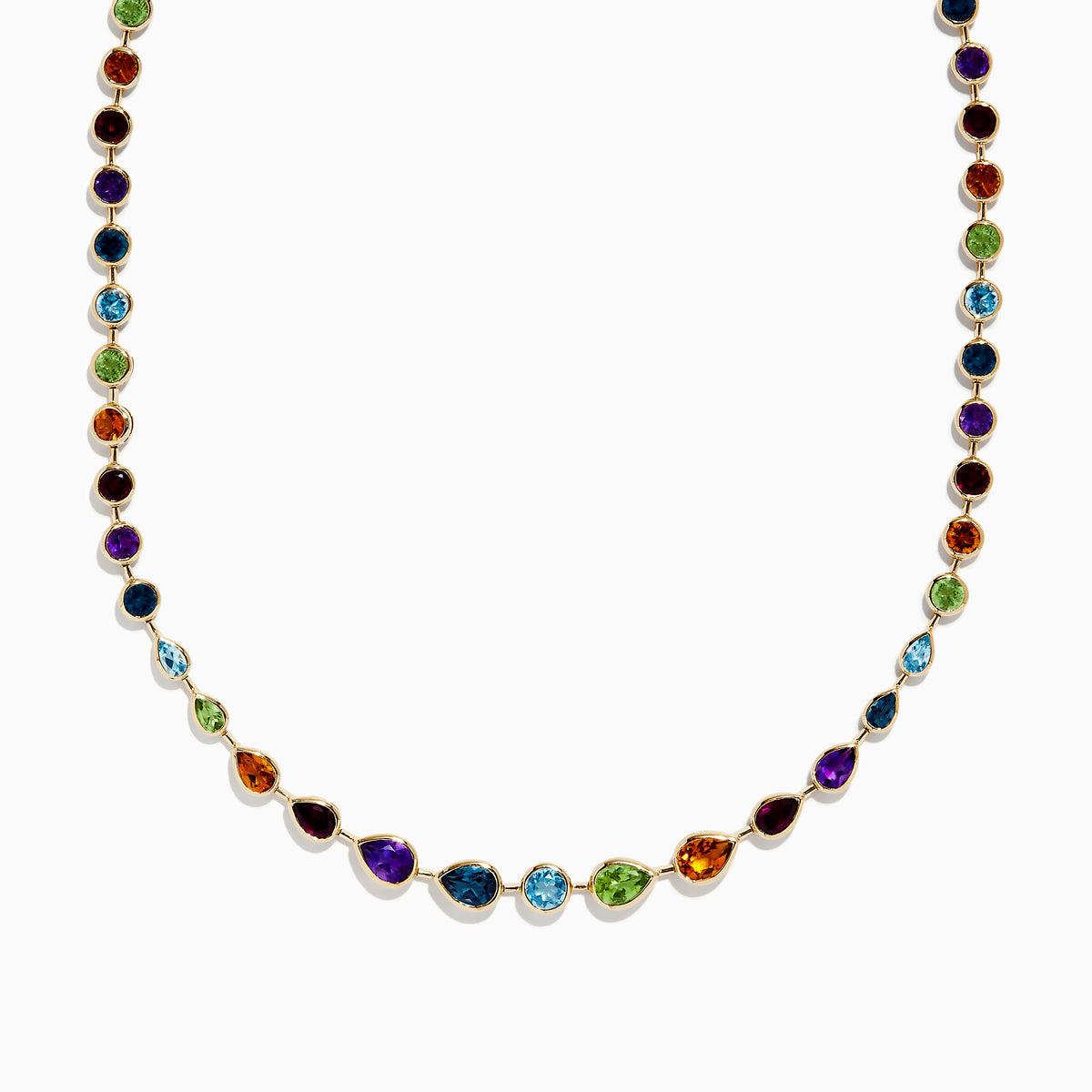 The Mosaic 14K Yellow Gold Multi Gemstone Necklace showcases small round and teardrop-shaped gems set on a gold chain, displayed against a white background.