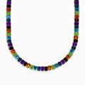 The Mosaic 14K Yellow Gold Multi Gemstone Necklace showcases square-cut gems in vibrant purple, orange, green, and blue set in a repeating pattern for a striking look on a white background.