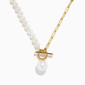 The 14K Yellow Gold Fresh Water Pearl & Paperclip Chain Necklace features alternating pearls and paperclip links, a 14K gold toggle clasp, and a single dangling pearl pendant.