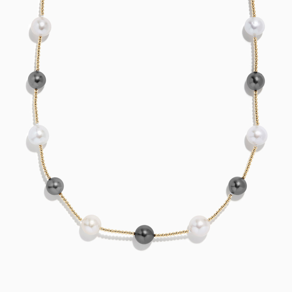 The 14K Yellow Gold Tahitian and Fresh Water Pearl Necklace features alternating black Tahitian pearls and white freshwater pearls, evenly spaced along a yellow gold chain and shown on a white background.