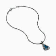 A 925 sterling silver and 18K yellow gold pendant with an ornate chain, featuring a triangular London blue and blue topaz set in an intricate frame.