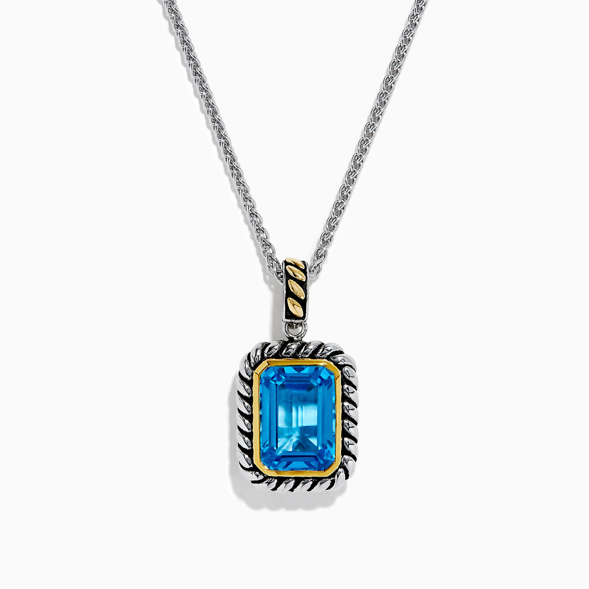 The Ocean Bleu 925 Sterling Silver and 18K Yellow Gold Blue Topaz Pendant features a rectangular faceted blue topaz framed by twisted silver and yellow gold accents on a sterling silver chain.
