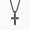 The Mens Rhodium Sterling Silver and Yellow Gold Plated Spinel Cross Pendant features a gold starburst center and hangs from a black chain, creating an elegant, striking look against a white background.