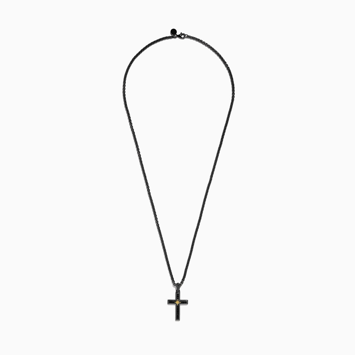 The Mens Rhodium Sterling Silver and Yellow Gold Plated Spinel Cross Pendant features a gold starburst center and hangs from a black chain, creating an elegant, striking look against a white background.