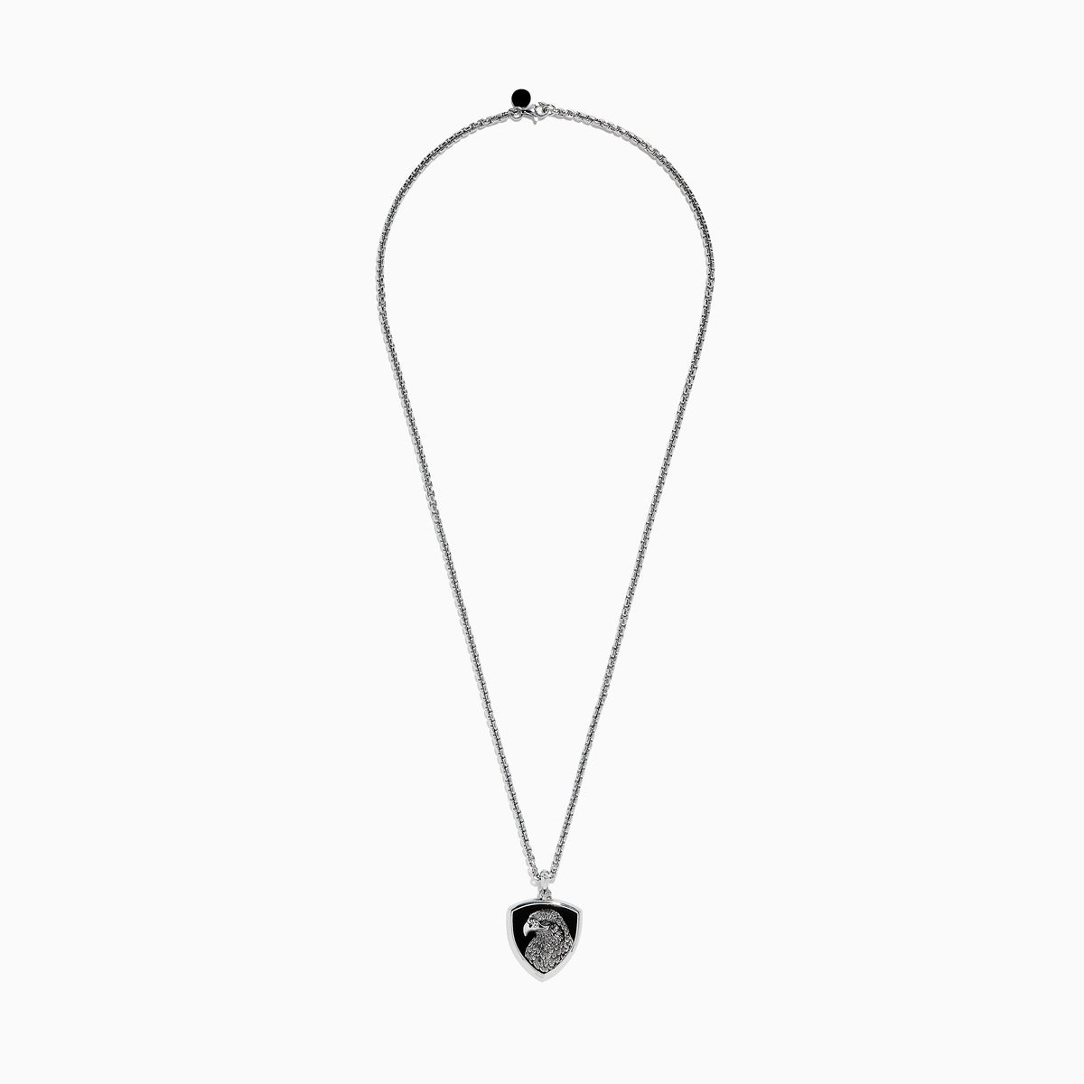 The Mens 925 Sterling Silver Onyx Pendant features a detailed engraved eagle head on a black shield-shaped background, crafted from sterling silver and suspended from a sleek silver chain.