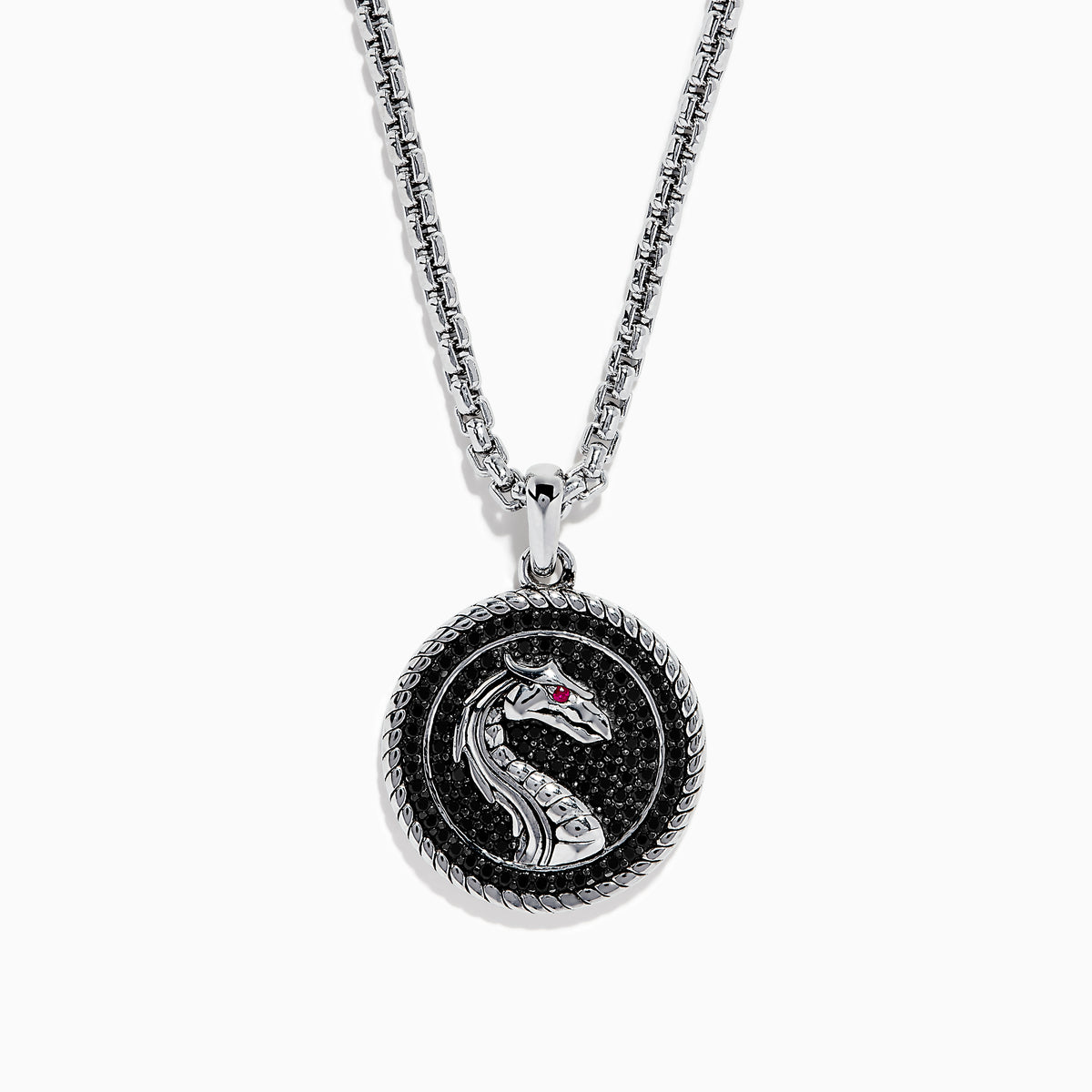 The Mens 925 Sterling Silver Black Spinel and Ruby Pendant features a round dragon design on a textured black background, with a small ruby as the dragons eye, suspended from a sterling silver chain necklace.
