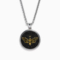 Discover the Men's 925 Sterling Silver Black Spinel Moth Pendant, featuring a detailed moth with a crescent moon above, all set against a black spinel-textured background—a unique and eye-catching accessory.