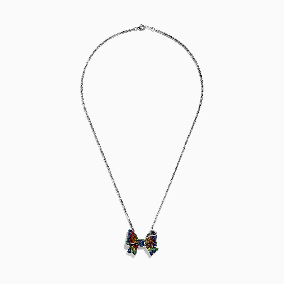 The Splash 925 Sterling Silver Multi Color Sapphire Bow Pendant showcases a stunning bow design adorned with sapphires in a vibrant rainbow pattern.